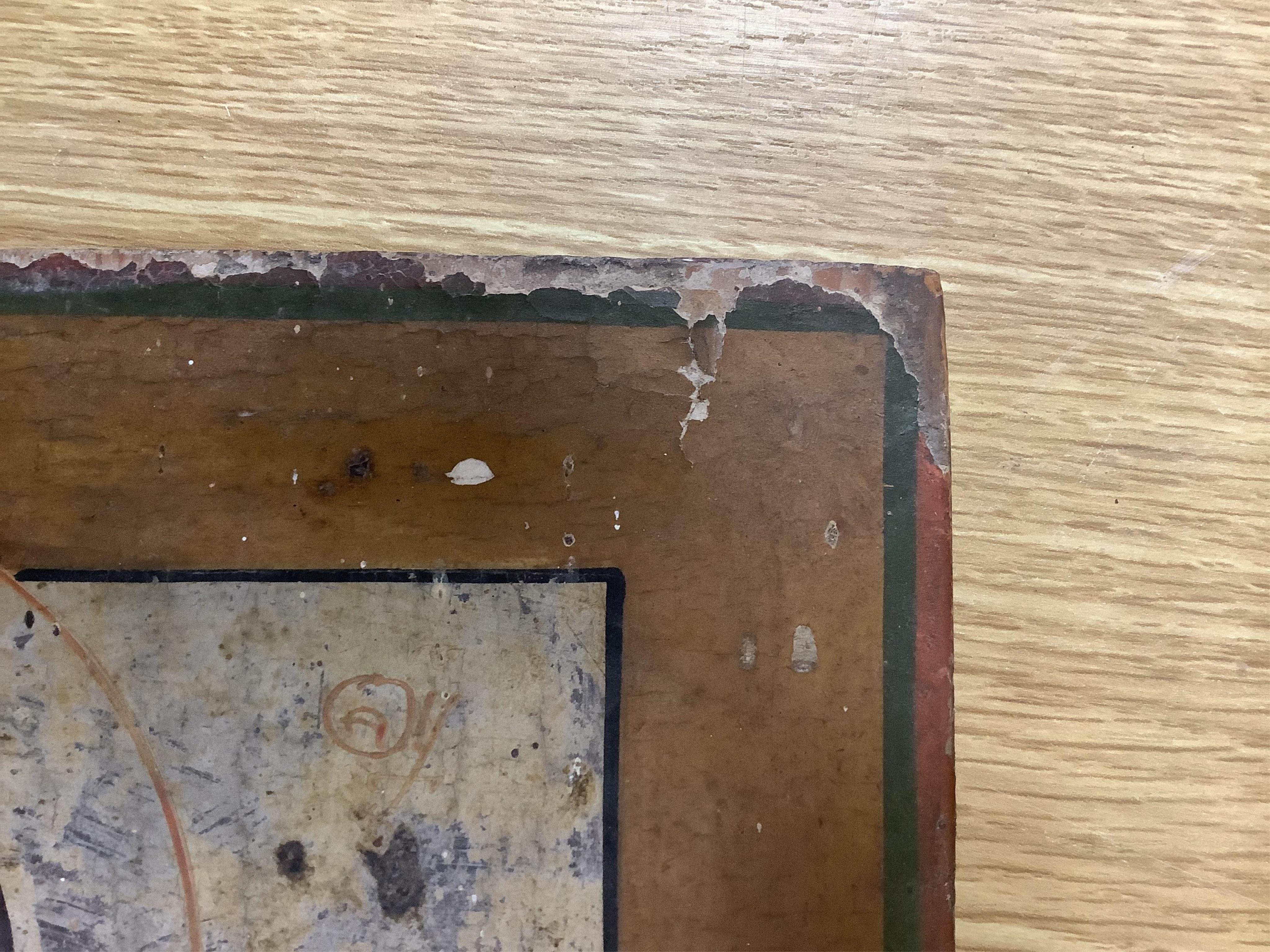 A 19th century Greek painted wood icon of Madonna and child, 31cm high